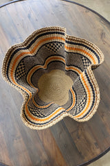 Made Brave wave basket displayed on an entryway table