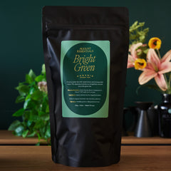 Brewed cup of mild bright green kukicha tea