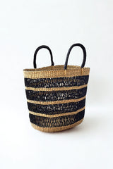 String Basket Tote in natural and black elephant grass with braided leather handles Made Brave