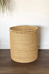 Made Brave lidded hamper styled in a bathroom corner