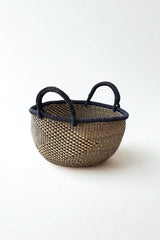 Handwoven natural and black checkerboard Bolga basket made in Ghana for Made Brave