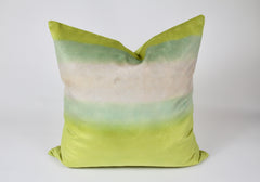 Close up of velvet texture and sunset print on Made Brave throw pillow