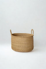 Handwoven short hamper in natural elephant grass made in Ghana for Made Brave