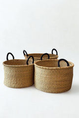 Medium handwoven hamper with leather handles made in Ghana for Made Brave