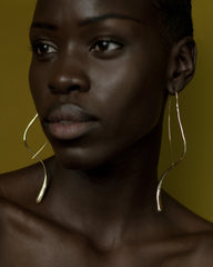 Close up of recycled brass texture on Made Brave Wadi earrings