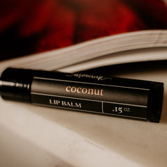 Coconut lip balm applied to lips by Made Brave