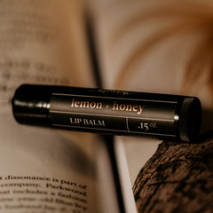 Lemon honey lip balm applied to lips by Made Brave