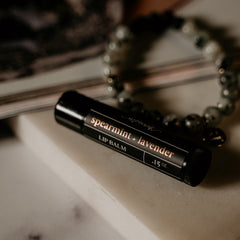 Spearmint lavender lip balm applied to lips by Made Brave