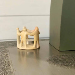 Circle of Friends Soapstone Sculpture showing interlocked figures Made Brave