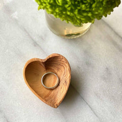 Heart-shaped olive wood trinket bowl showing natural wood grain Made Brave