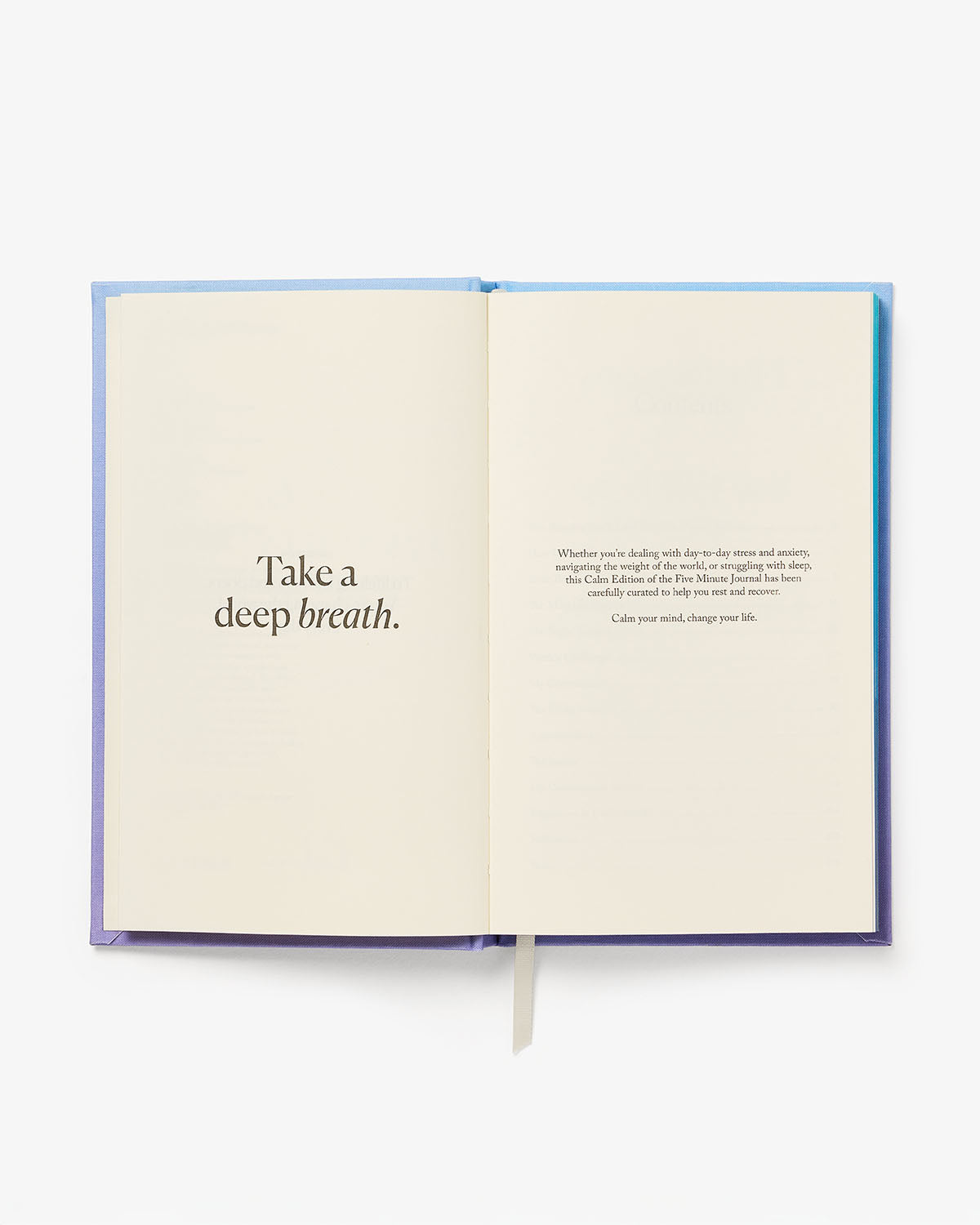 Five Minute Journal open to daily gratitude prompts morning and evening
