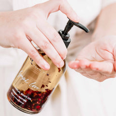 Botanical body massage oil glass pump bottle jojoba frankincense citrus